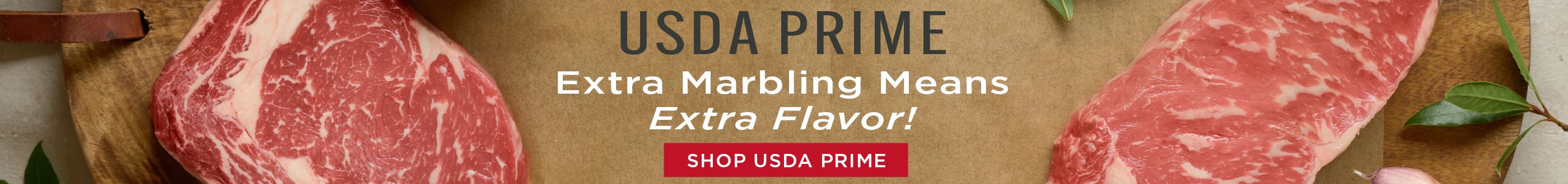 USDA Prime Steaks spread on cutting board.