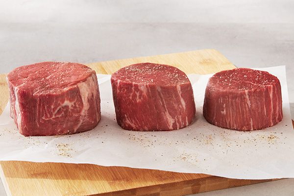 Choice Filet Mignon on cutting board.