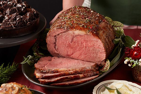 Holiday dinner ideas spread on holiday table.