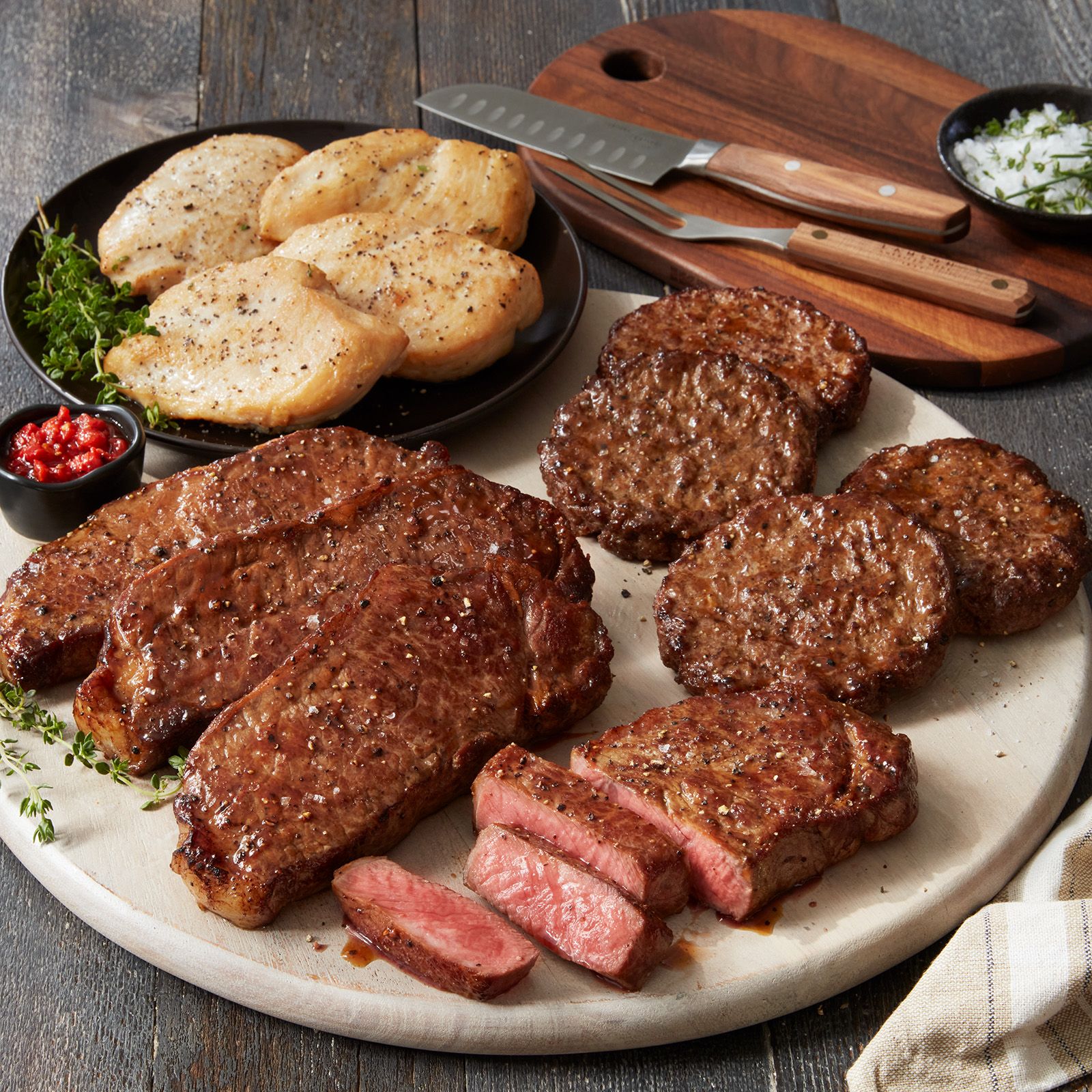 Various proteins on cutting board